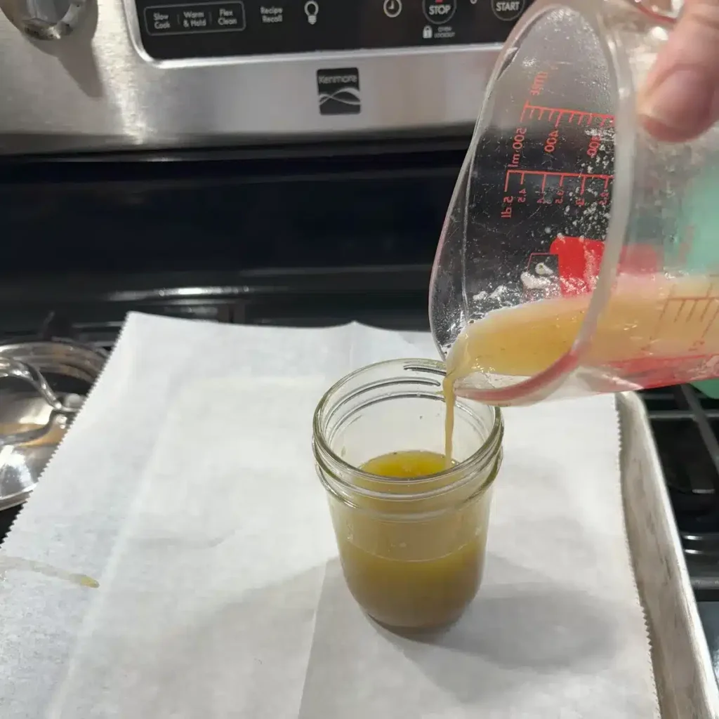 Pour butter into mason jar